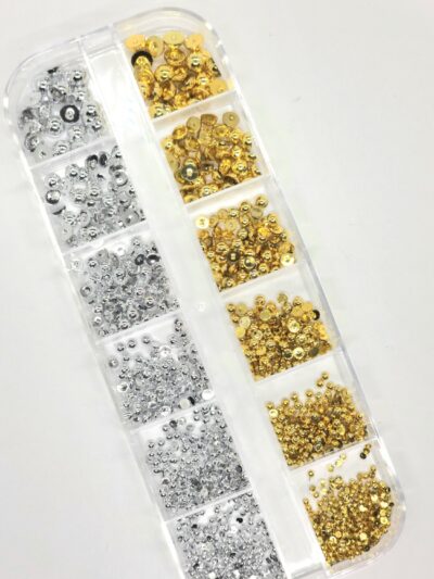 Puolipallolajitelma kulta/hopea tasapohjalla